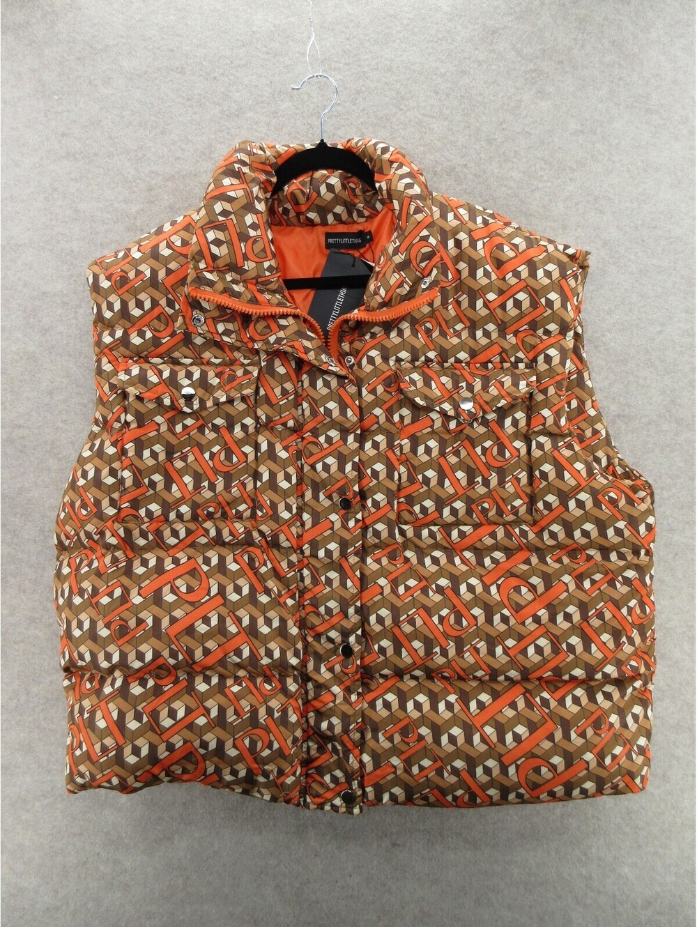 PrettyLittleThing Women’s Medium Monogram Puffer Vest Orange Brown Geometric